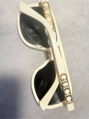 Gucci Cream Cat-Eye Sunglasses with Black Lenses and Gold Logo